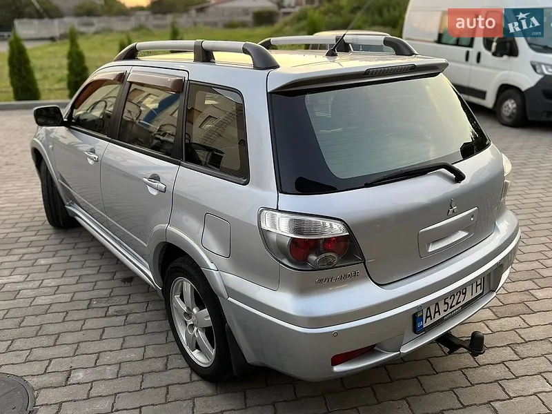Mitsubishi Outlander 2006 VIN JMBXRCU5W7U000678 фото оголошення 12 з 153