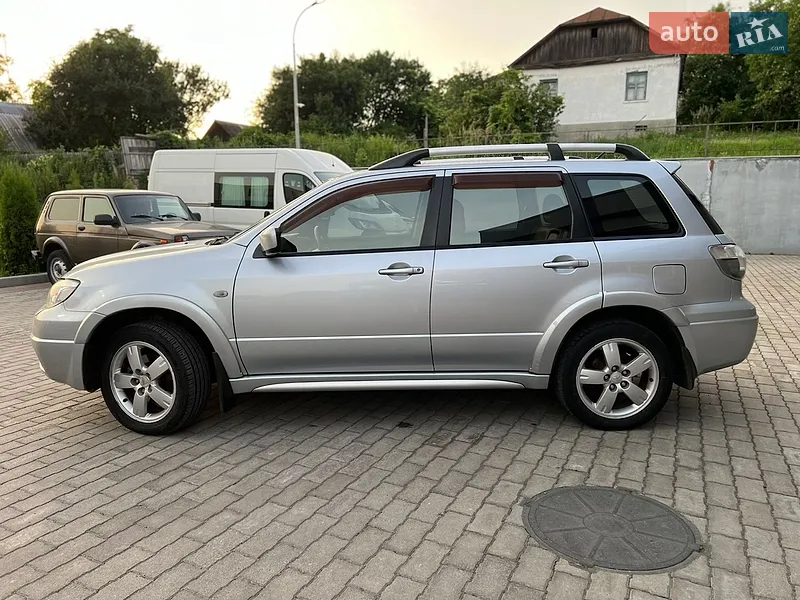 Mitsubishi Outlander 2006 VIN JMBXRCU5W7U000678 фото оголошення 13 з 153