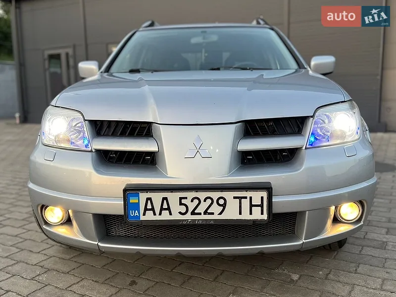 Mitsubishi Outlander 2006 VIN JMBXRCU5W7U000678 фото оголошення 15 з 153