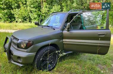 Внедорожник / Кроссовер Mitsubishi Pajero Pinin 1999 в 