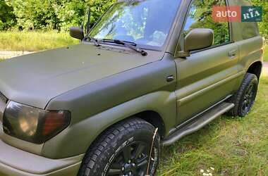 Внедорожник / Кроссовер Mitsubishi Pajero Pinin 1999 в 