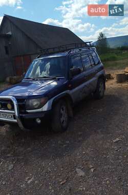 Внедорожник / Кроссовер Mitsubishi Pajero Pinin 1999 в 