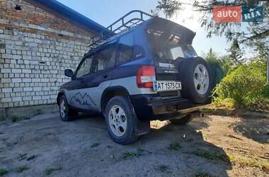 Внедорожник / Кроссовер Mitsubishi Pajero Pinin 1999 в 