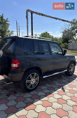 Внедорожник / Кроссовер Mitsubishi Pajero Pinin 2002 в 