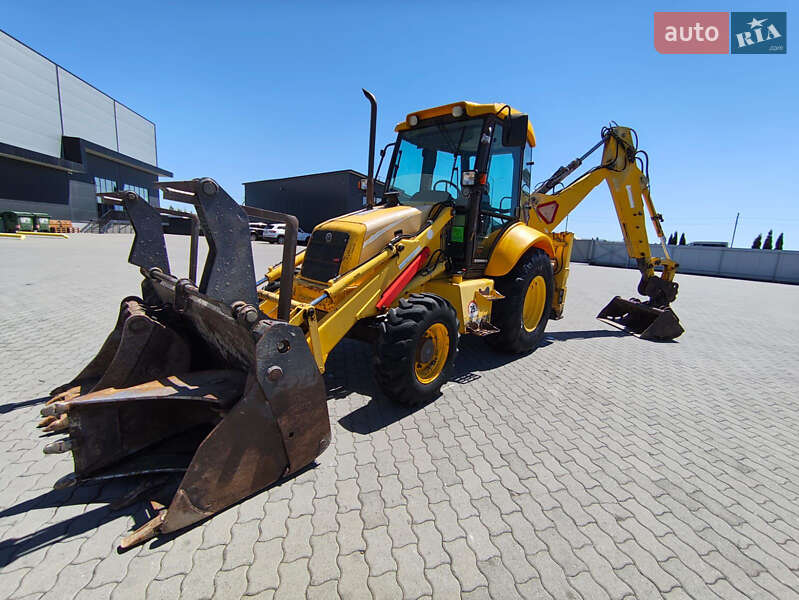 Екскаватор навантажувач New Holland LB95B-4PT 2003 в Львові