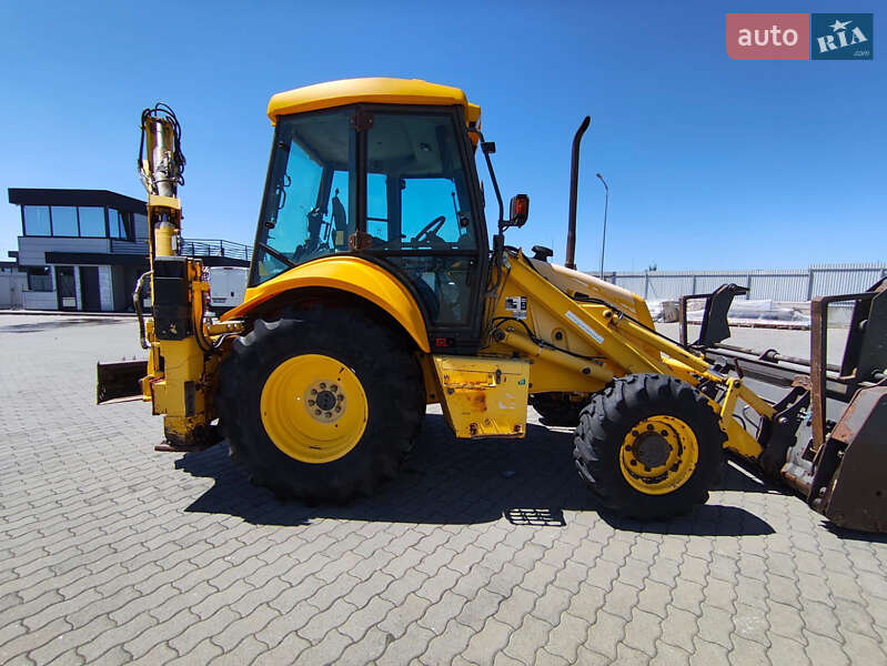 Екскаватор навантажувач New Holland LB95B-4PT 2003 в Львові