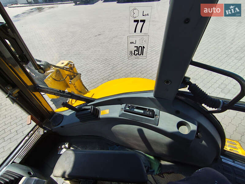 Екскаватор навантажувач New Holland LB95B-4PT 2003 в Львові