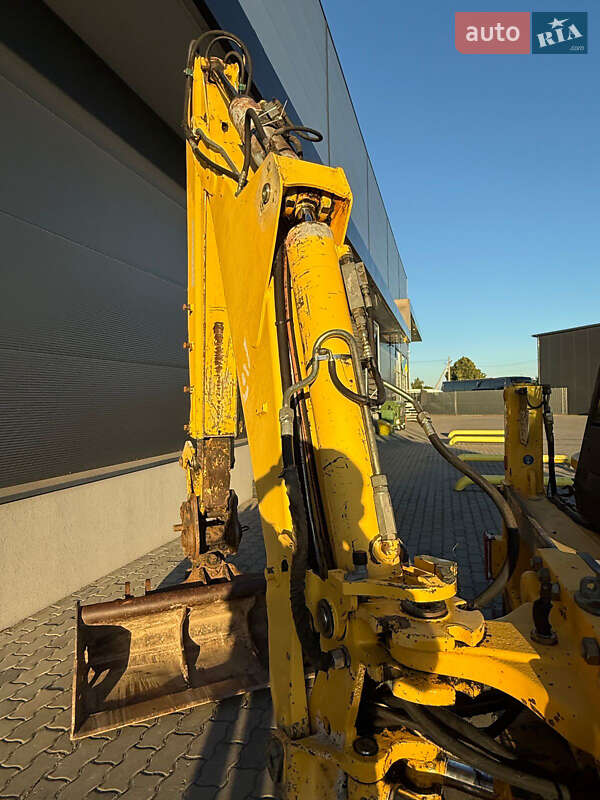 Екскаватор навантажувач New Holland LB95B-4PT 2003 в Львові
