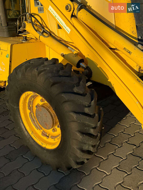 Екскаватор навантажувач New Holland LB95B-4PT 2003 в Львові
