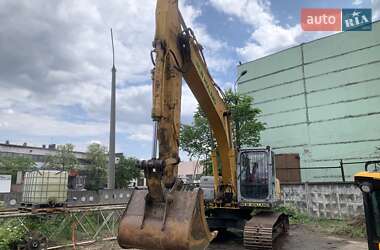 Гусеничный экскаватор New Holland LB 2008 в 