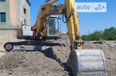 Гусеничный экскаватор New Holland LB 2007 в 