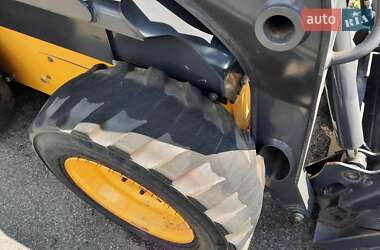 Миниэкскаватор New Holland LB 2012 в 