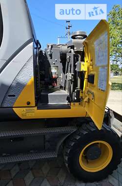 Колесный экскаватор New Holland MH 3.6 2009 в 