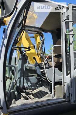 Колесный экскаватор New Holland MH 3.6 2009 в 