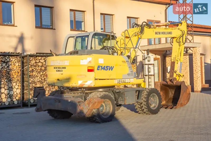Колесный экскаватор New Holland MH 3.6 2003 в 