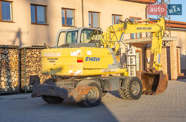 Колесный экскаватор New Holland MH 3.6 2003 в 