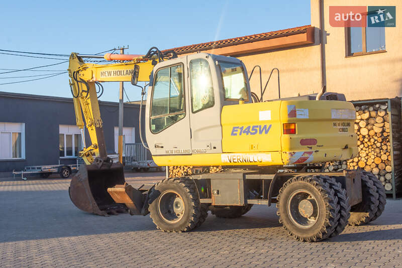 Колесный экскаватор New Holland MH 3.6 2003 в Житомире фото 12 Колесный экскаватор New Holland MH 3.6 2003 в Житомире