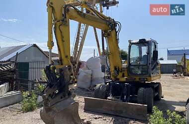 Екскаватор навантажувач New Holland MH 3.6 2007 в 