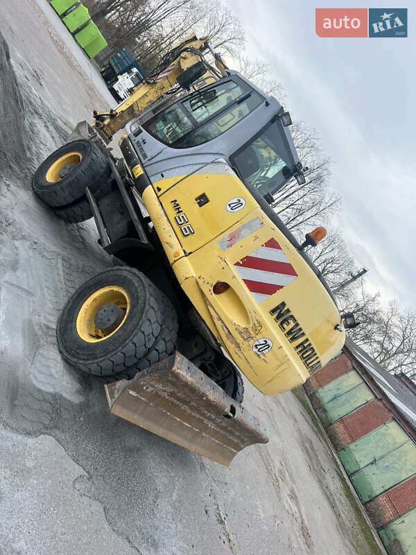 Колісний екскаватор New Holland MH 5.6 2008 в 