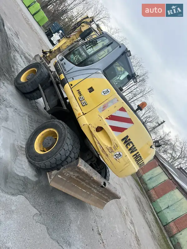 Колесный экскаватор New Holland MH 5.6 2008 в 