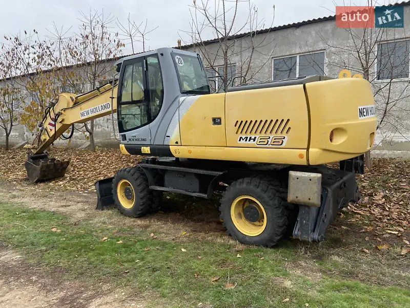 Колесный экскаватор New Holland MH 6.6 2005 в 
