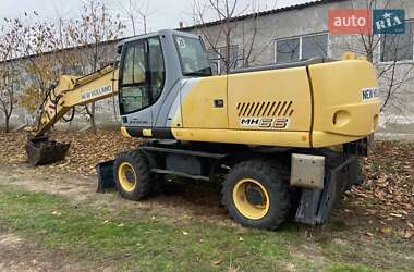 Колесный экскаватор New Holland MH 6.6 2005 в 
