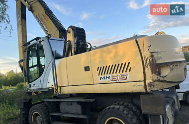Колесный экскаватор New Holland MH 6.6 2005 в 