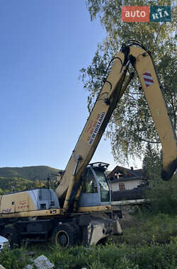 Колесный экскаватор New Holland MH 6.6 2005 в 