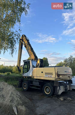 Колесный экскаватор New Holland MH 6.6 2005 в 