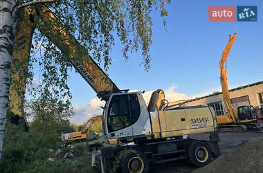 Колесный экскаватор New Holland MH 6.6 2005 в 