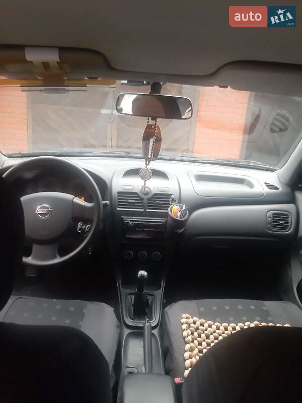 Седан Nissan Almera Classic 2010 в Охтирці