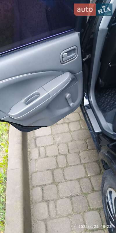 Седан Nissan Almera 2012 в Буче