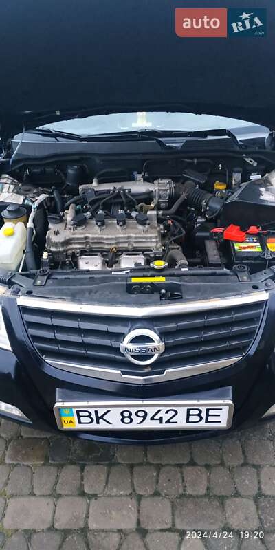 Седан Nissan Almera 2012 в Буче