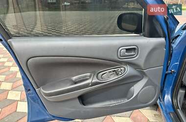 Хэтчбек Nissan Almera 2005 в 