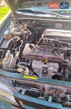 Хэтчбек Nissan Almera 1997 в 