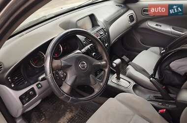 Хэтчбек Nissan Almera 2003 в 