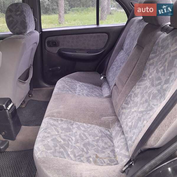 Седан Nissan Almera 1997 в Вишневом