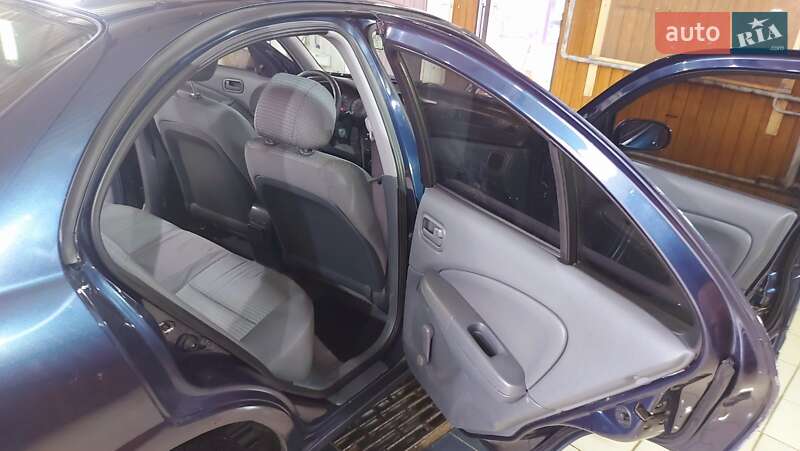 Седан Nissan Almera 2007 в Остер