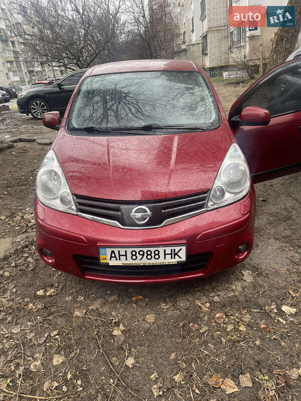 2011 Nissan Note, VIN SJNFAAE11U2125311:plate — фото 1 (autoria)