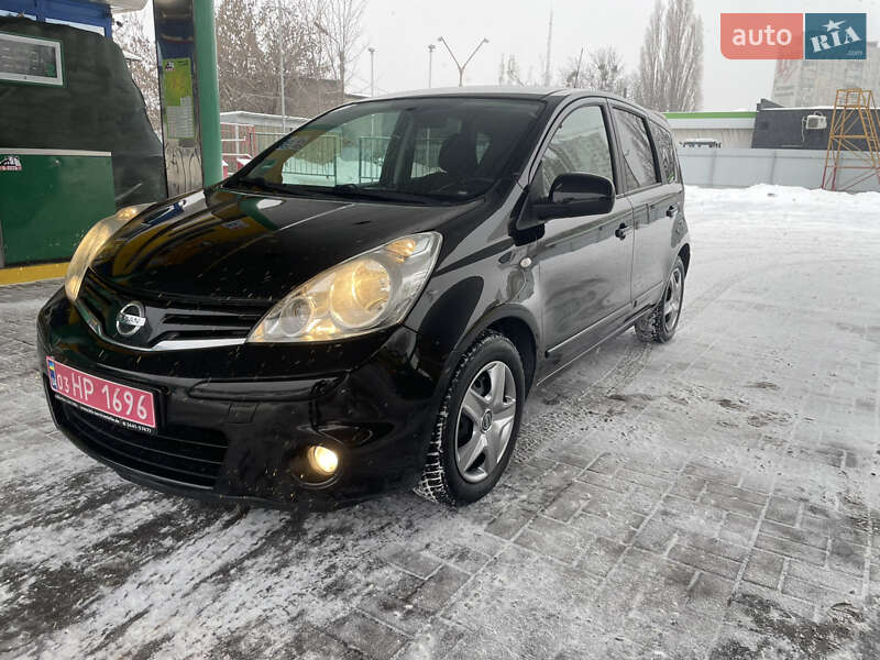 2009 Nissan Note, VIN SJNFAAE11U2044651:plate — фото 1 (autoria)
