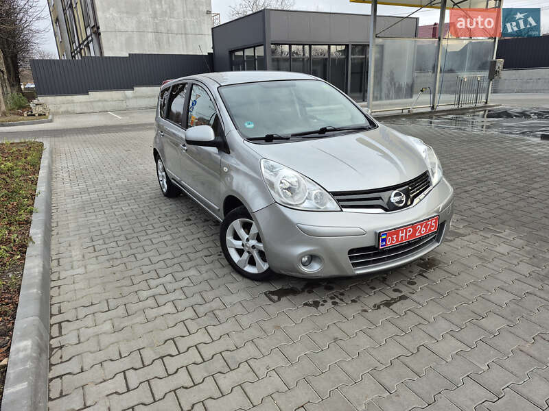 2010 Nissan Note, VIN SJNFAAE11U2072965:plate — photo 1 (autoria)