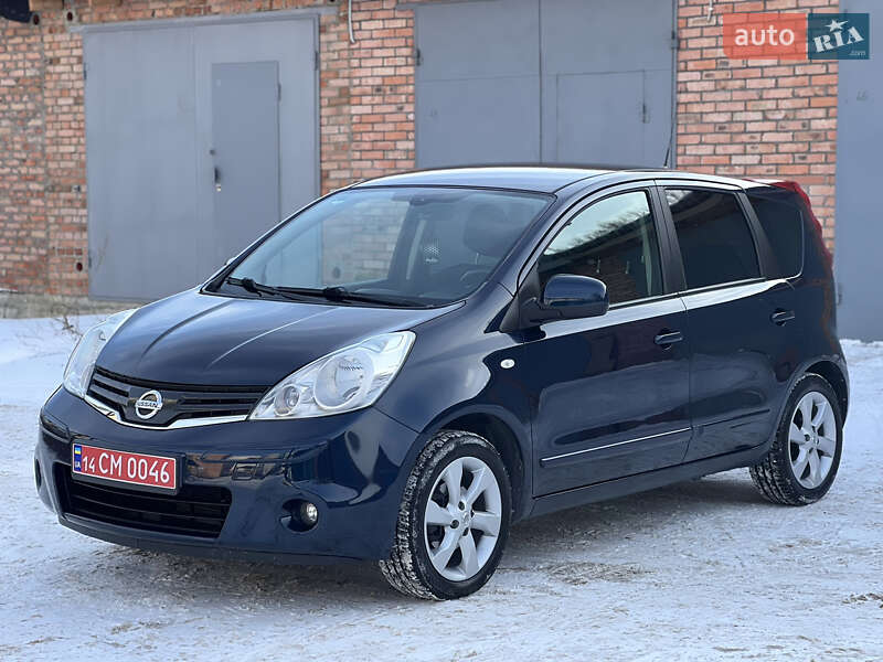 2009 Nissan Note, VIN SJNFCAE11U2011690:plate — фото 1 (autoria)