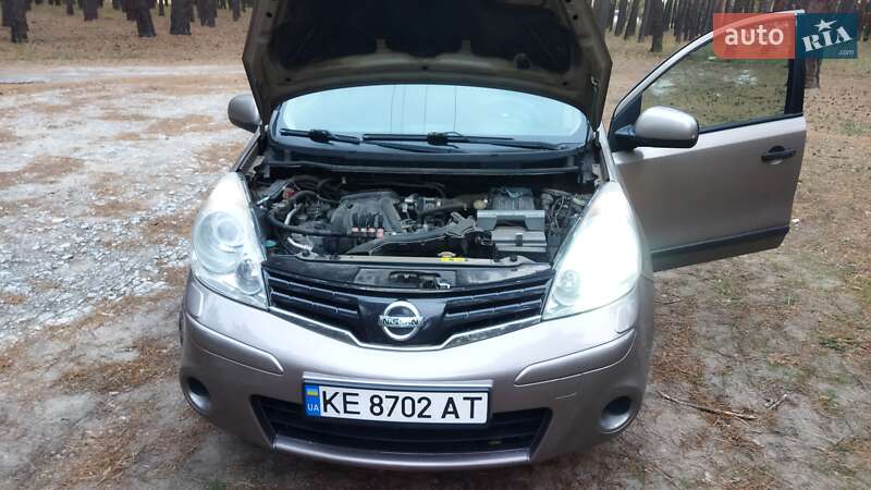 2011 Nissan Note, VIN SJNFCAE11U2116521:plate — фото 1 (autoria)