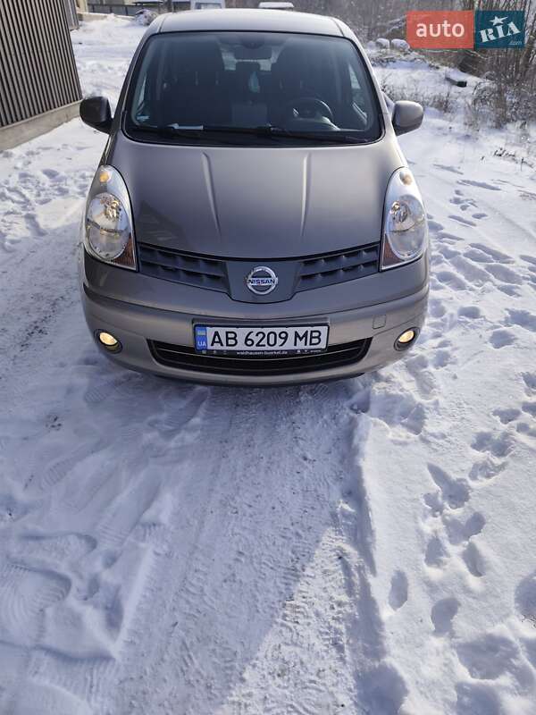 2008 Nissan Note, VIN SJNFDAE11U1290374:plate — фото 1 (autoria)