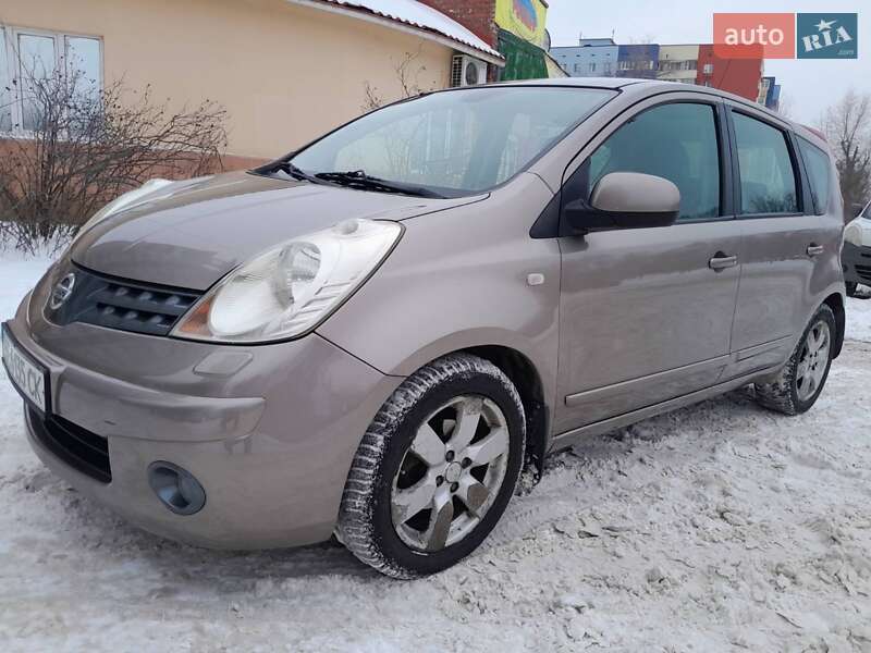 2008 Nissan Note, VIN SJNFCAE11U1287492:plate — фото 1 (autoria)