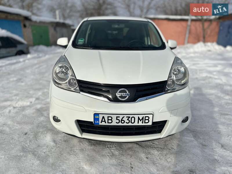 2009 Nissan Note, VIN SJNFAAE11U2023604:plate — фото 1 (autoria)