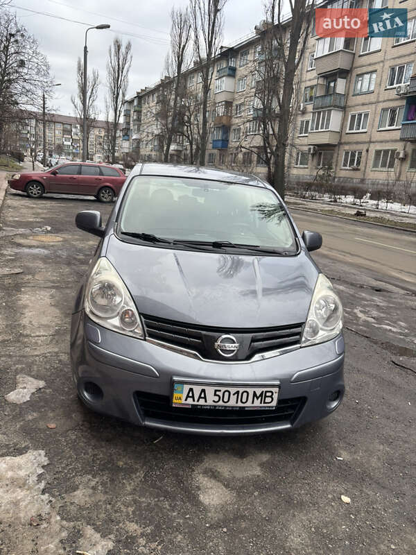 2010 Nissan Note, VIN SJNFAAE11U2095511:plate — фото 1 (autoria)