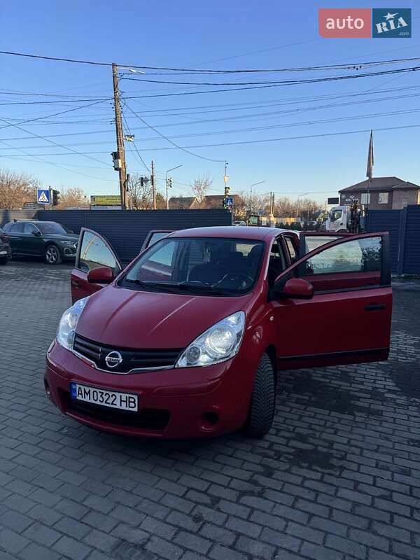 2009 Nissan Note, VIN SJNFAAE11U2017083:plate — фото 1 (autoria)