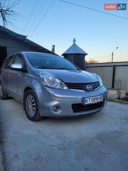 2009 Nissan Note, VIN SJNFAAE11U2022520:plate — фото 1 (autoria)