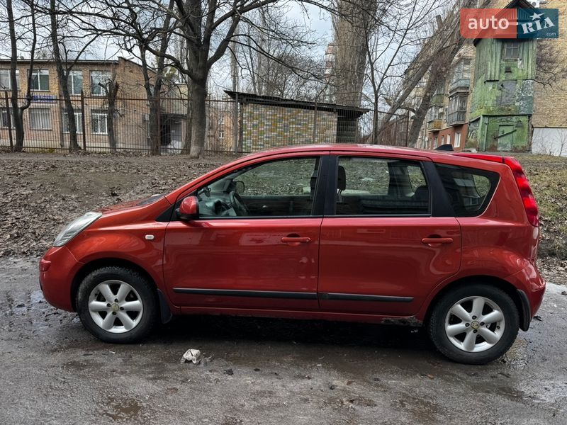 2008 Nissan Note, VIN SJNFAAE11U1268196:plate — фото 1 (autoria)